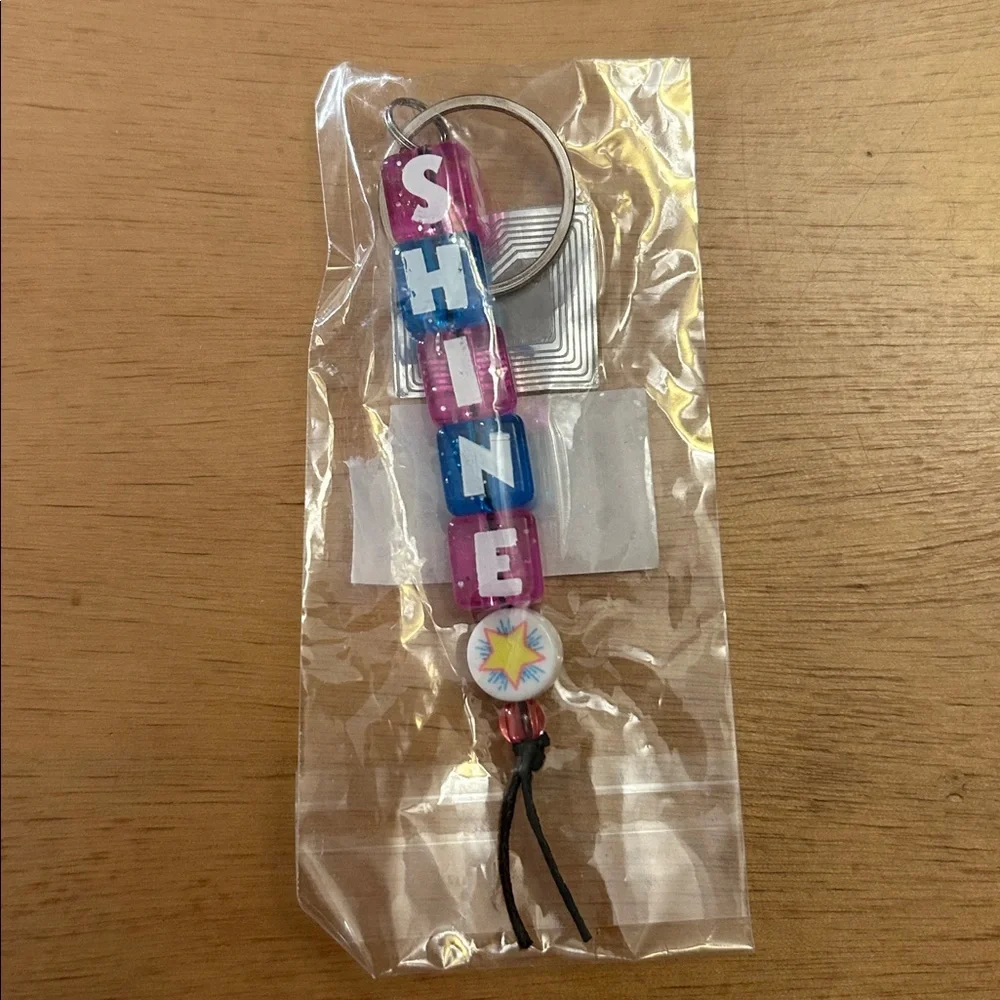 Free with bundle or purchase new Kids 🧒🏻 Shine Block Charm Keychain